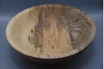 Hand-Turned Spalted Ash Bowl with Natural Bore Detail Hand-Turned Spalted Ash Bowl with Natural Bore Detail
