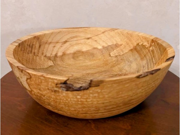 Hand made solid wood food safe Ash bowl with natural details. Hand made solid wood food safe Ash bowl with natural details.