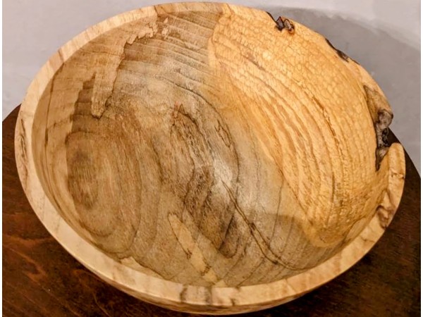 Hand made solid wood food safe Ash bowl with natural details.